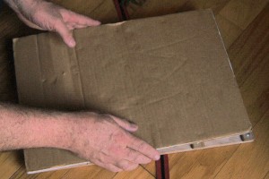 Adding corrugated cardboard for cushion and ventilation